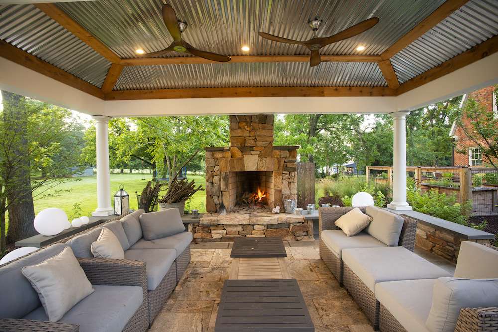 pavilion with outdoor fireplace and seating area