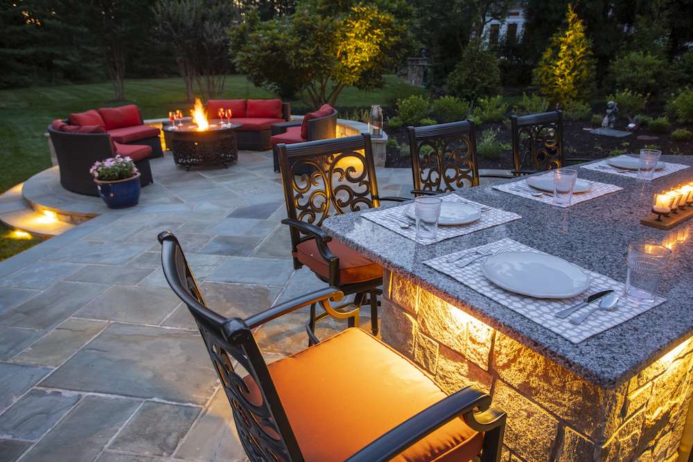 outdoor kitchen build and patio with fire pit