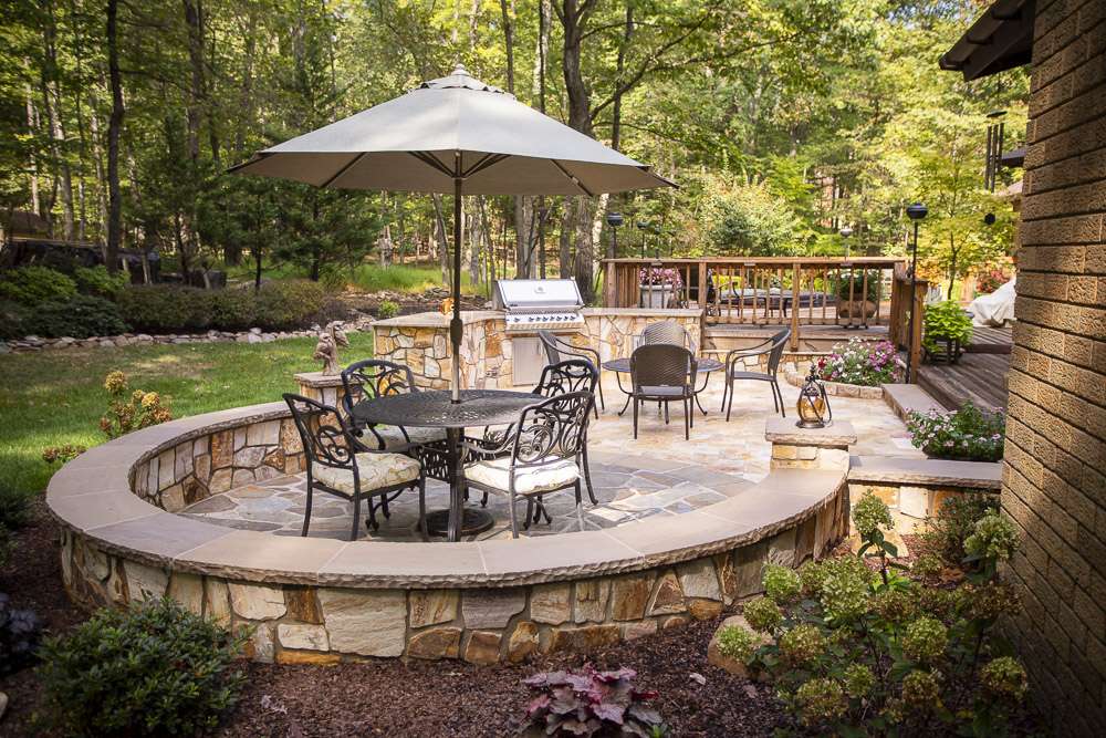 outdoor kitchen and seating area