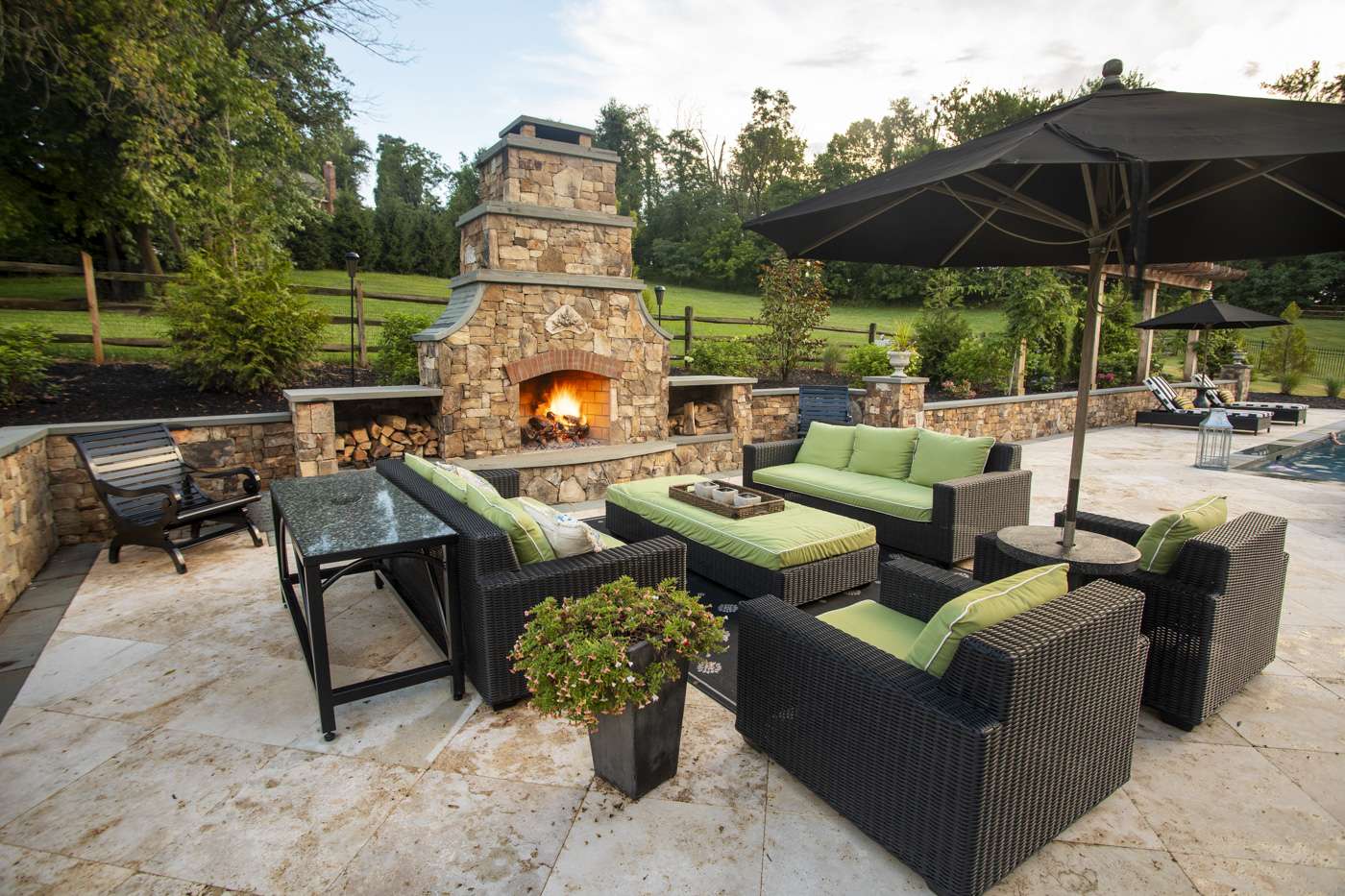 outdoor fireplace and large patio design