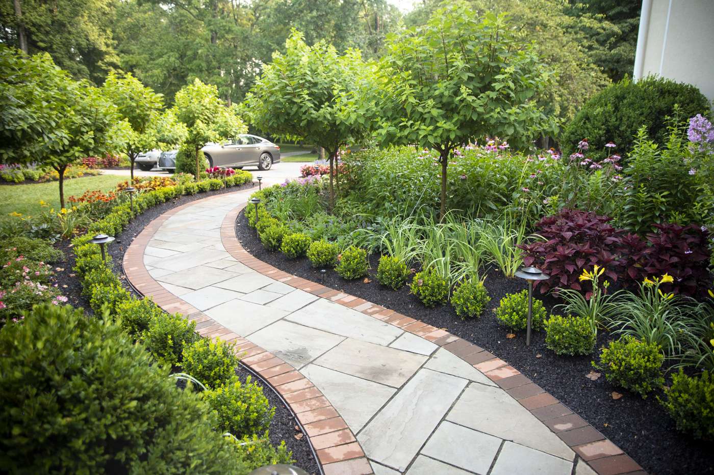 Walkway guiding guests through the landscape