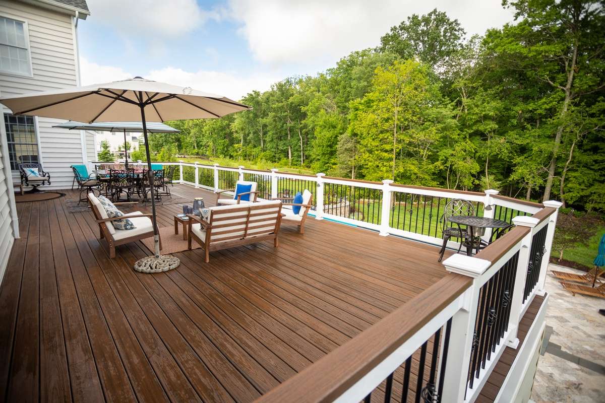 deck with seating areas and dining area