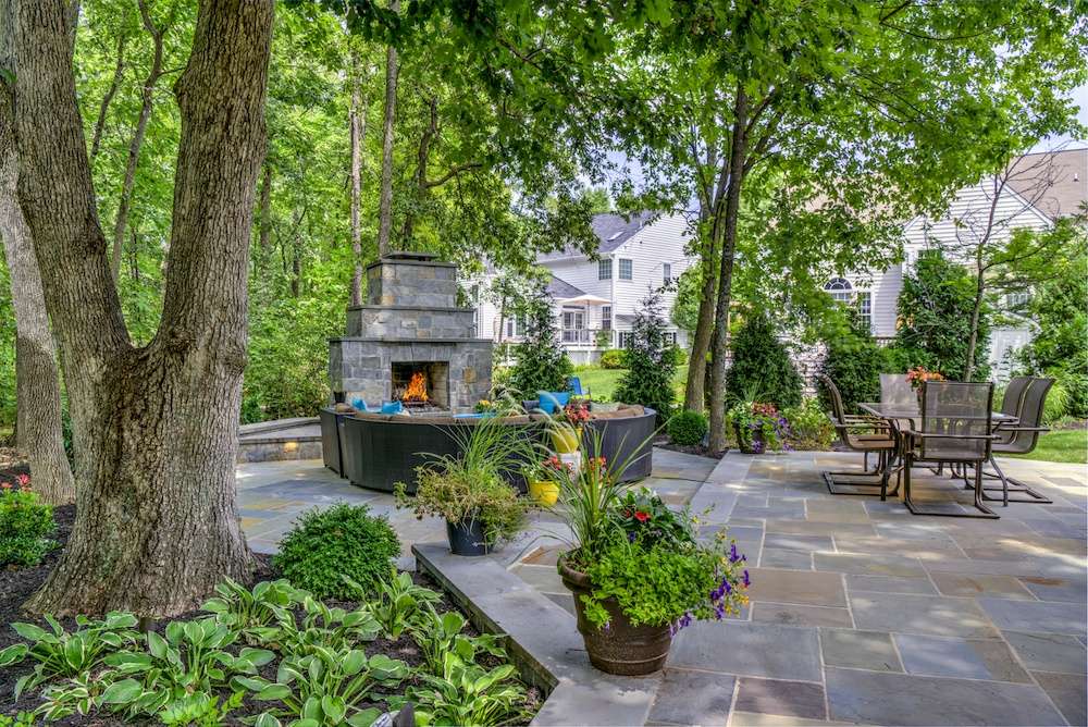 Patio with natural stone and outside fireplace