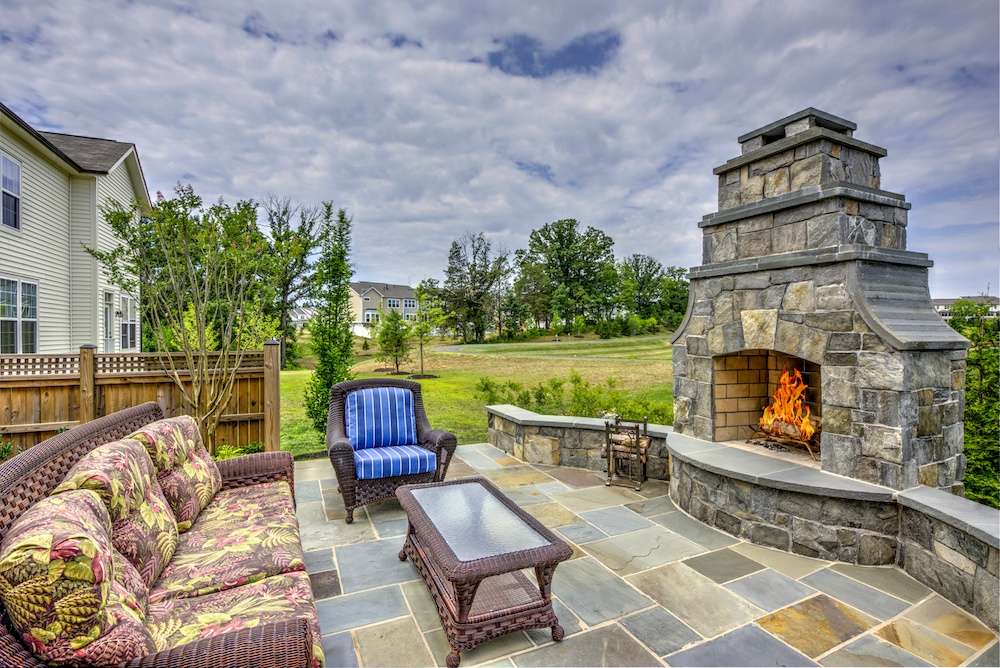 Outdoor fireplace and flagstone patio