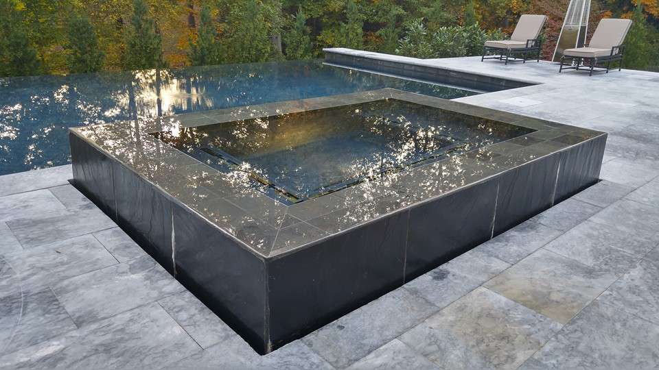 pool with adjoining spa
