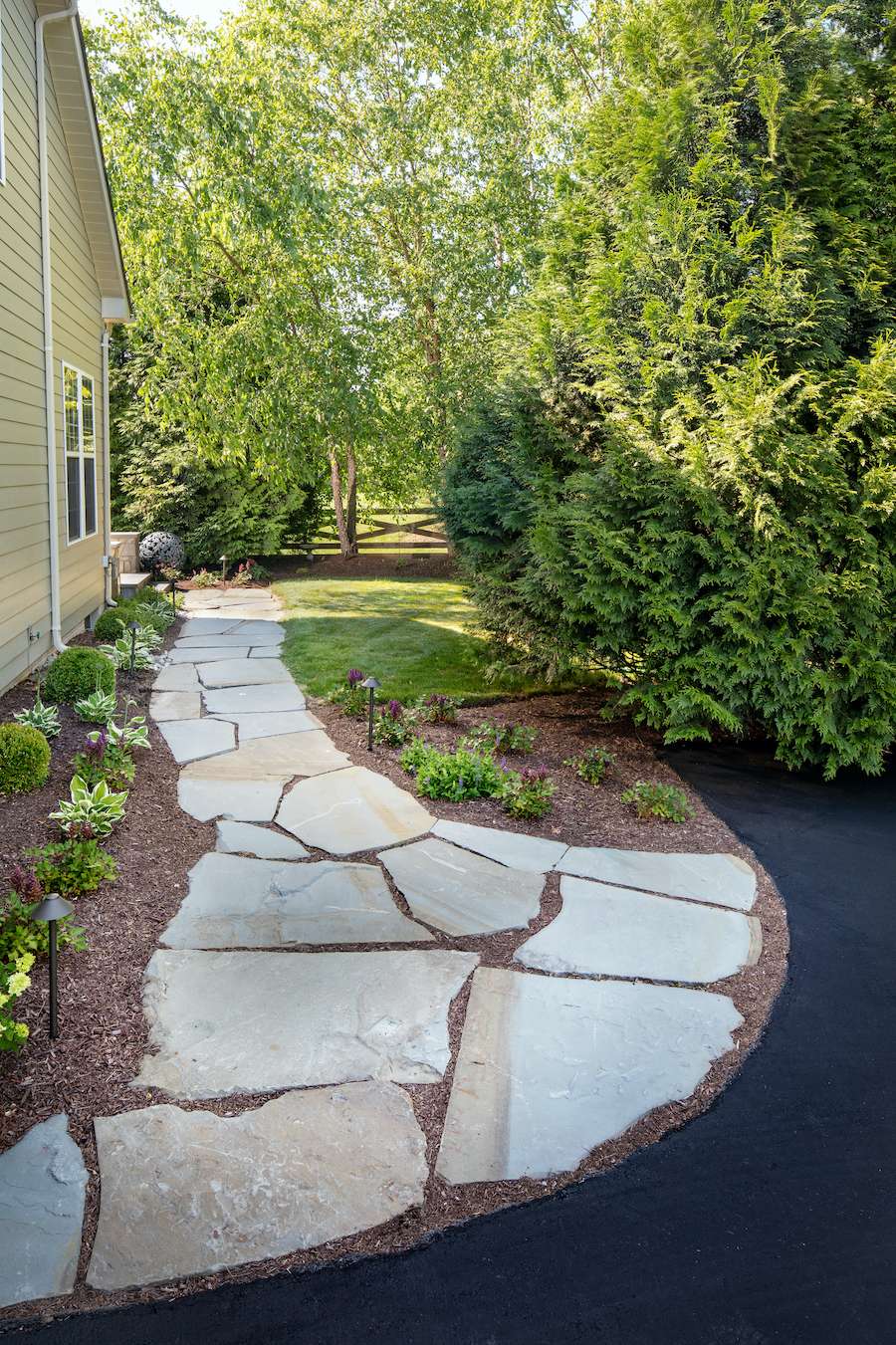 landscape walkway with flagstone stepping stones