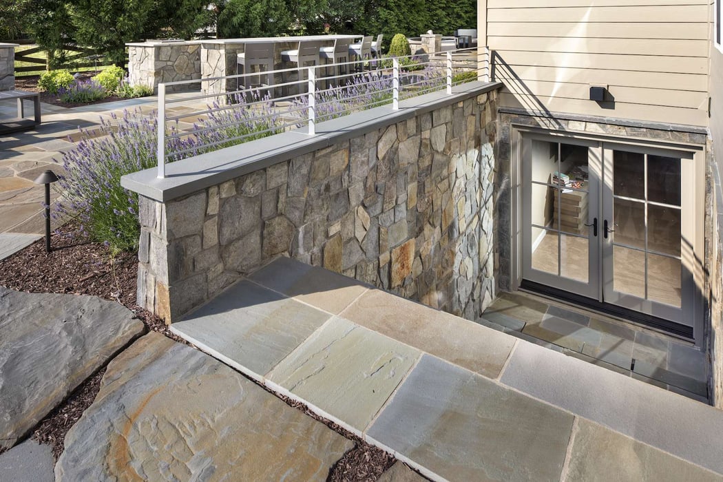 landscape design with natural stone basement walk-up