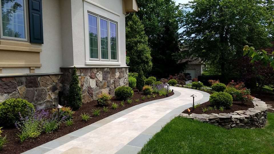 Stone walkway and landscape plantings