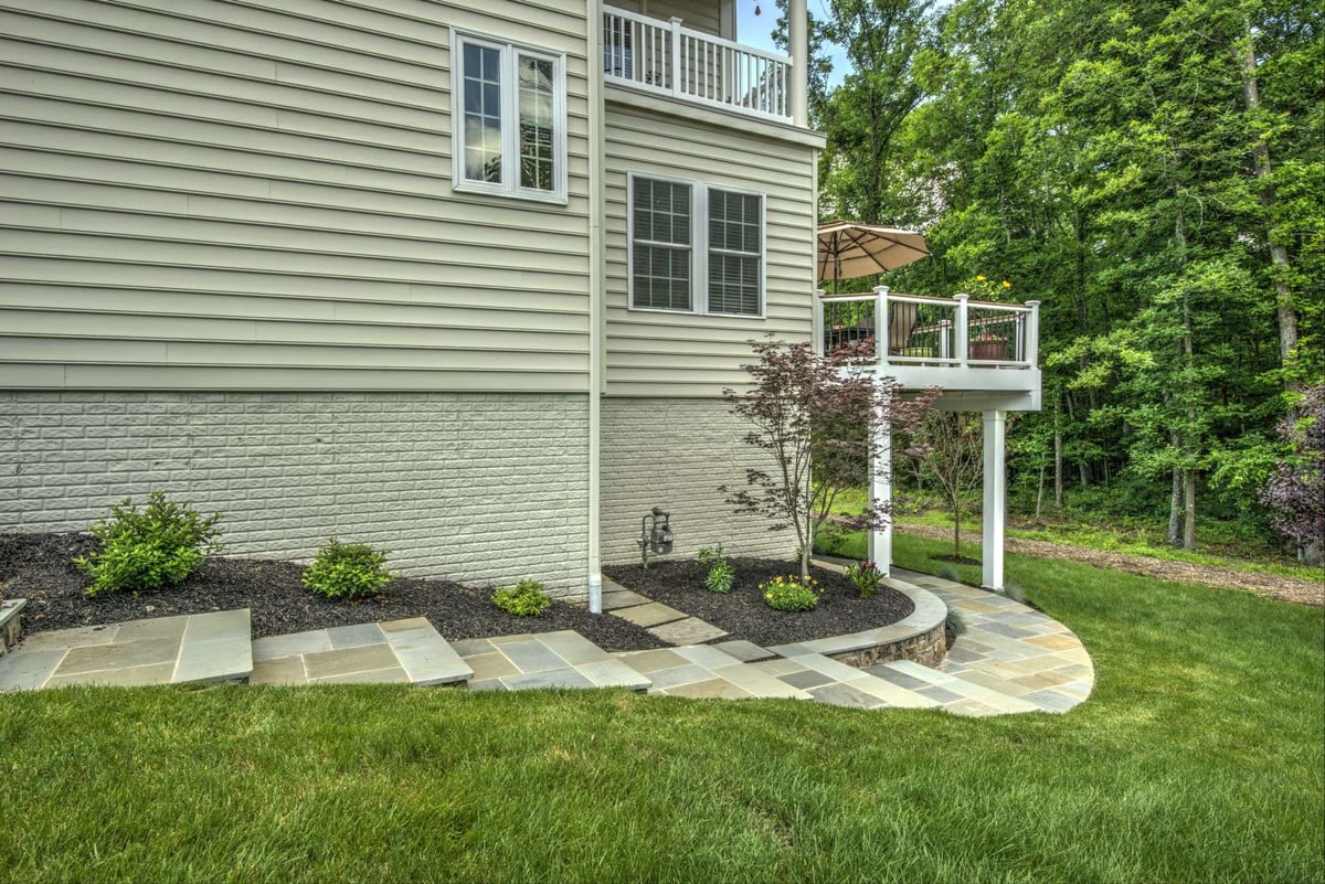 natural stone walkway steps to patio