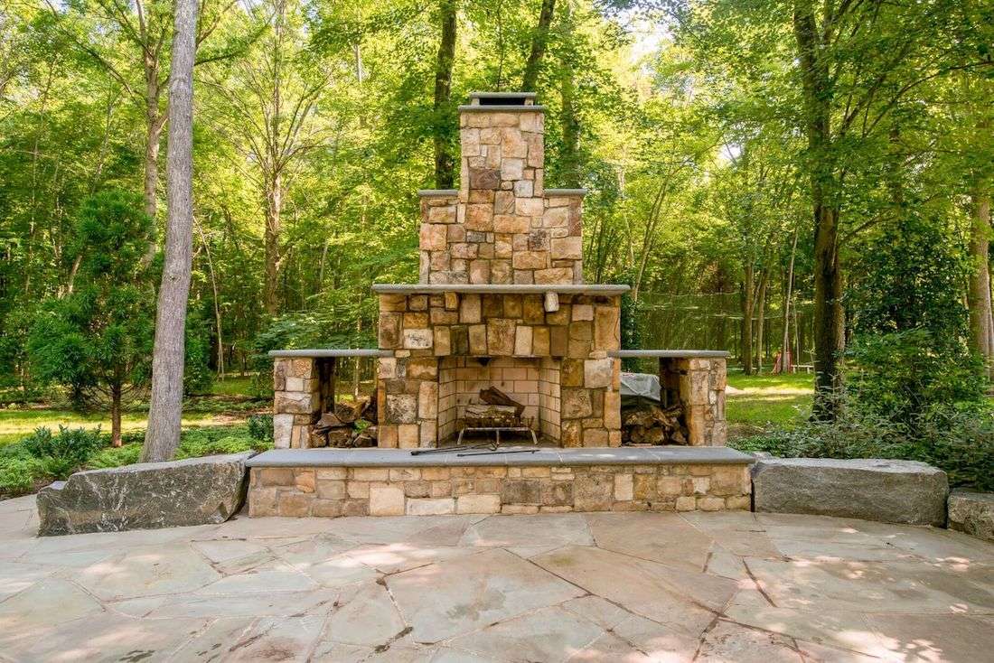 outdoor fireplace idea to build in wood storage