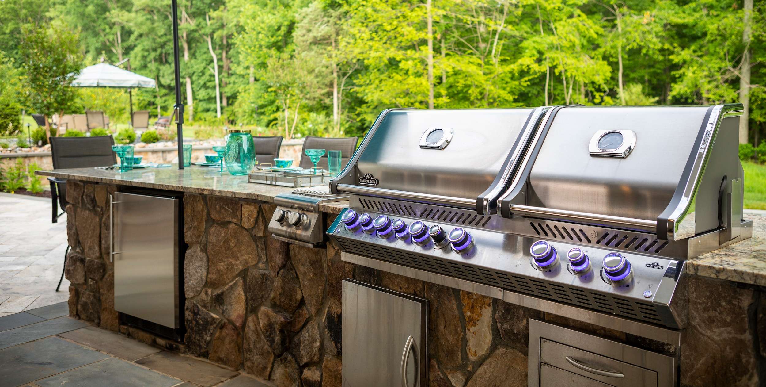 outdoor kitchen near pool