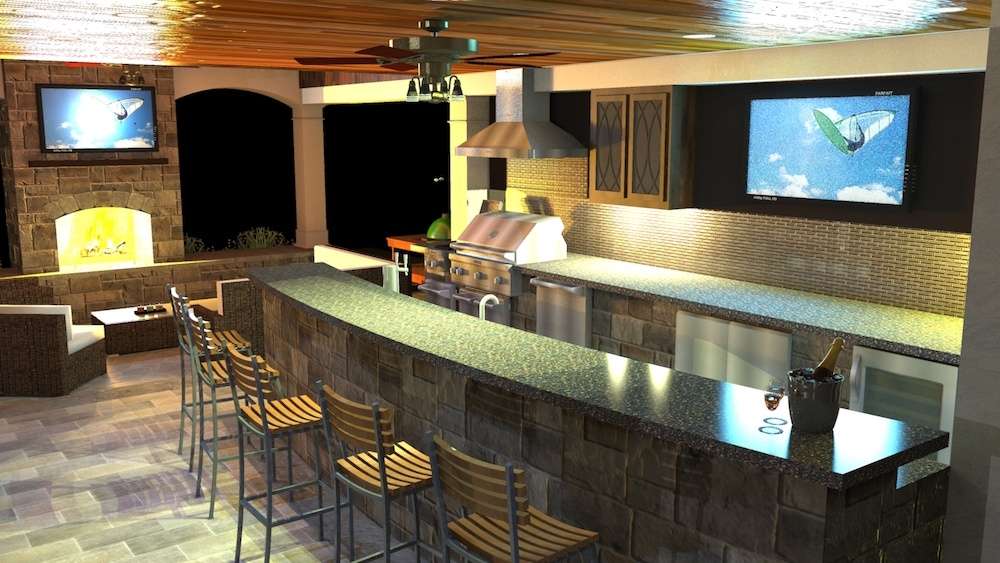 Covered outdoor kitchen with bar and tv