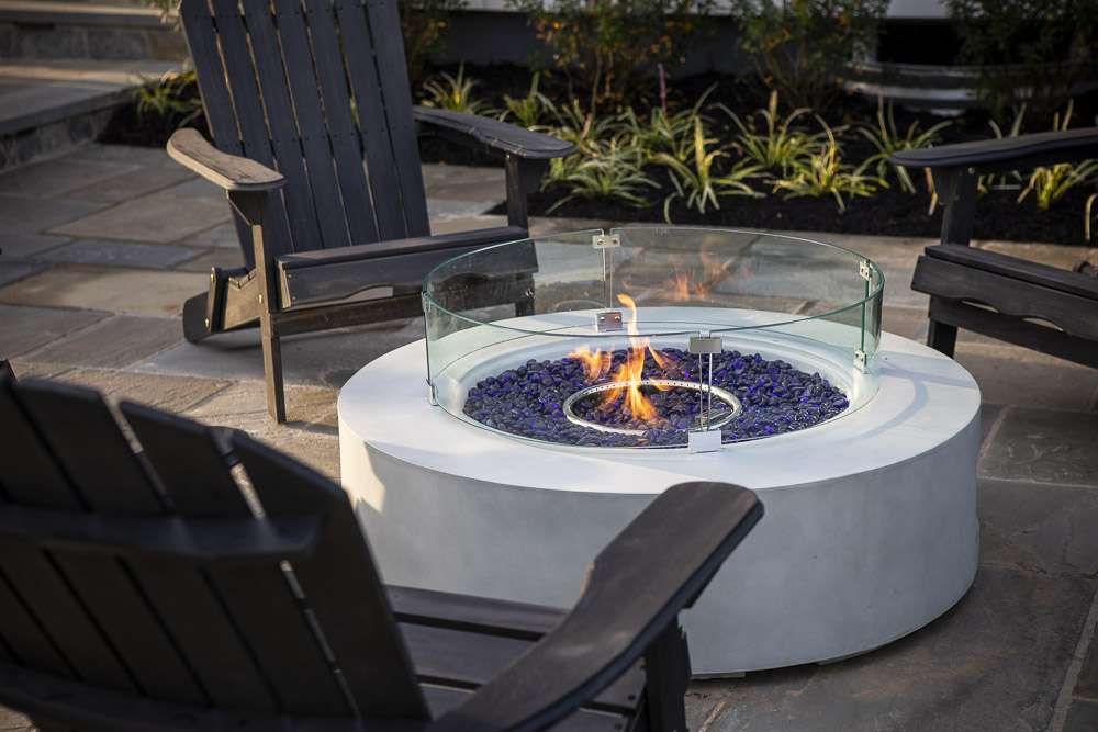 gas fire pit on patio with seating