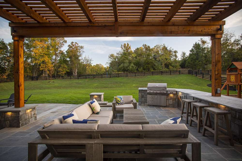 Hardscape patio with pergola and outdoor kitchen