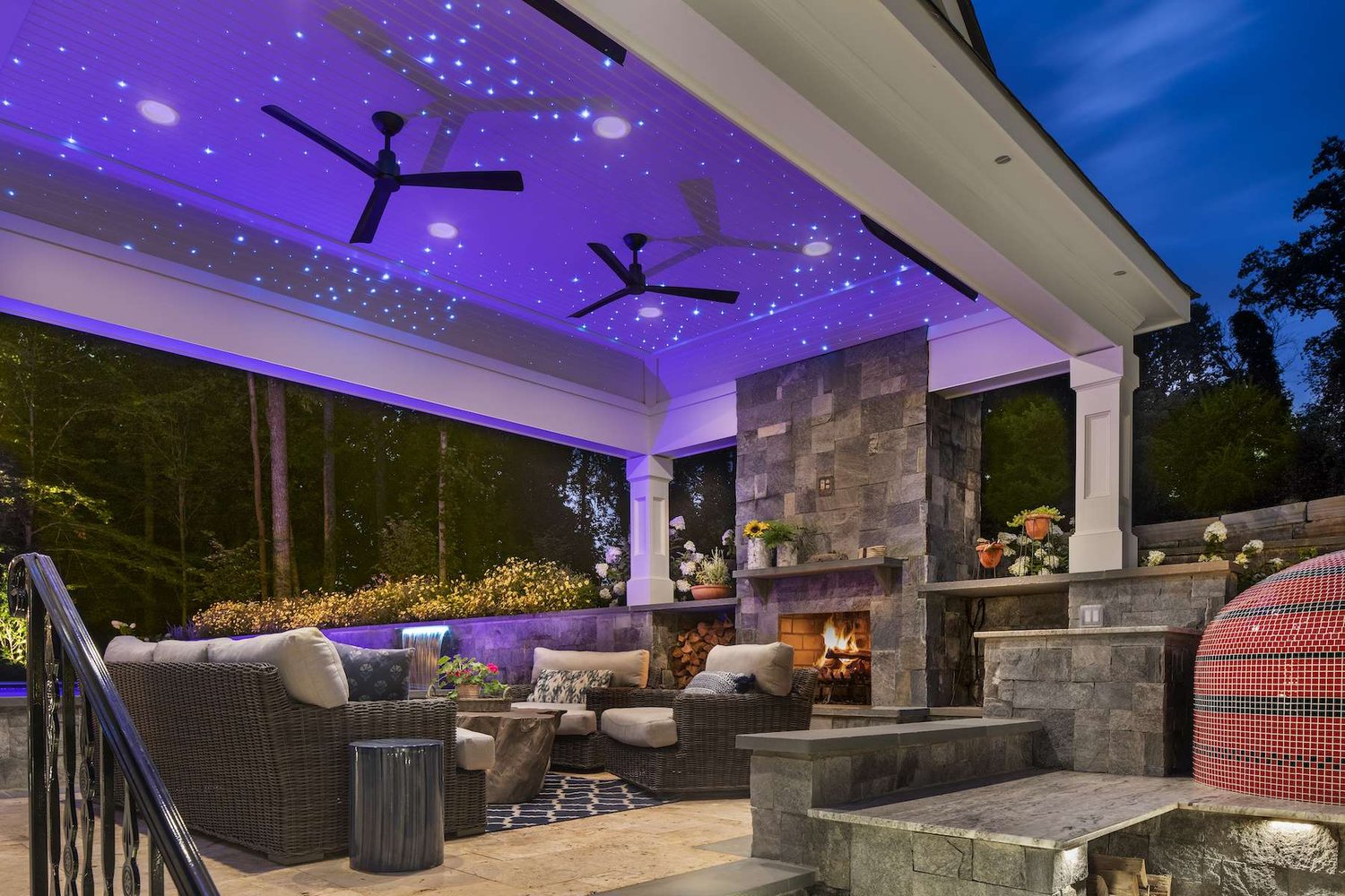 Backyard entertainment area, seating, and fireplace