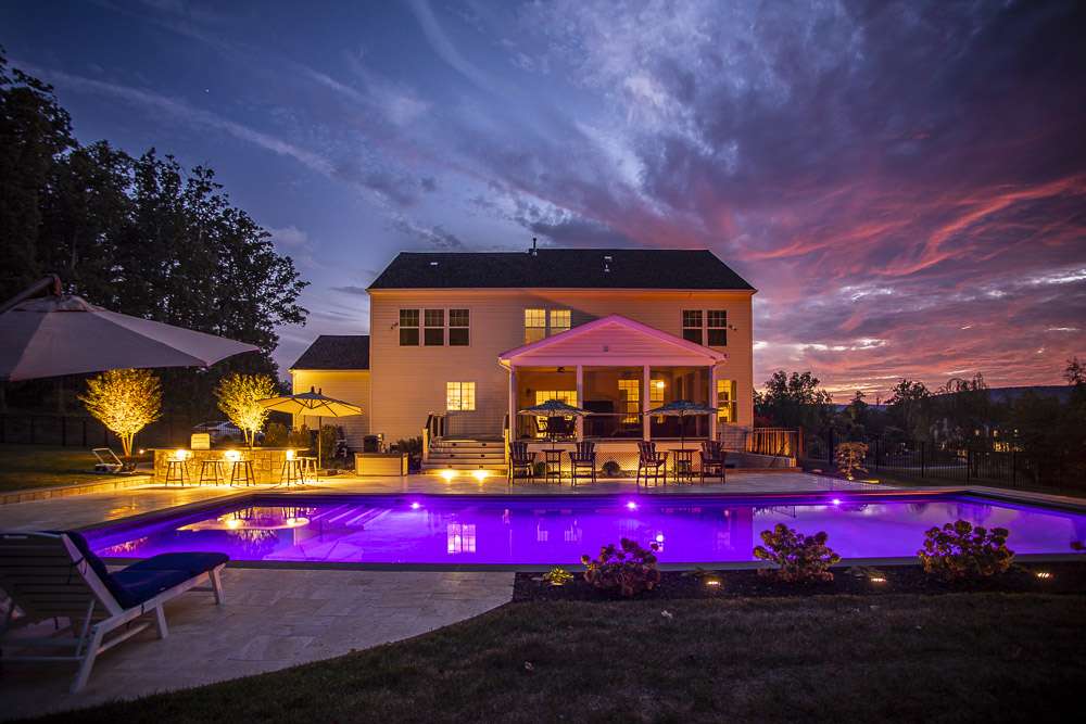 landscape lighting around pool and patio