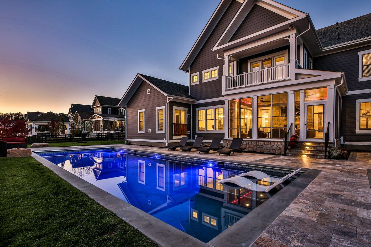 pool with night lighting and built in loungers