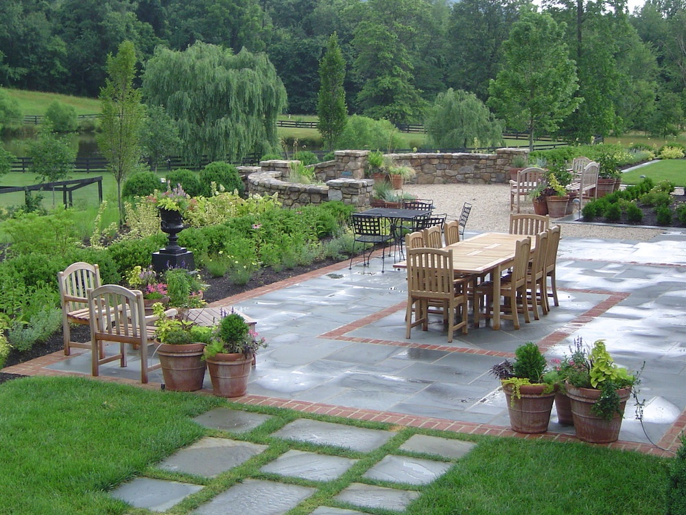 flagstone patio with brick and landscape beds