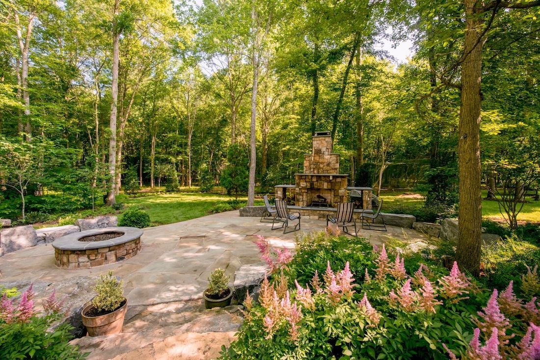 patio with plantings and firepit