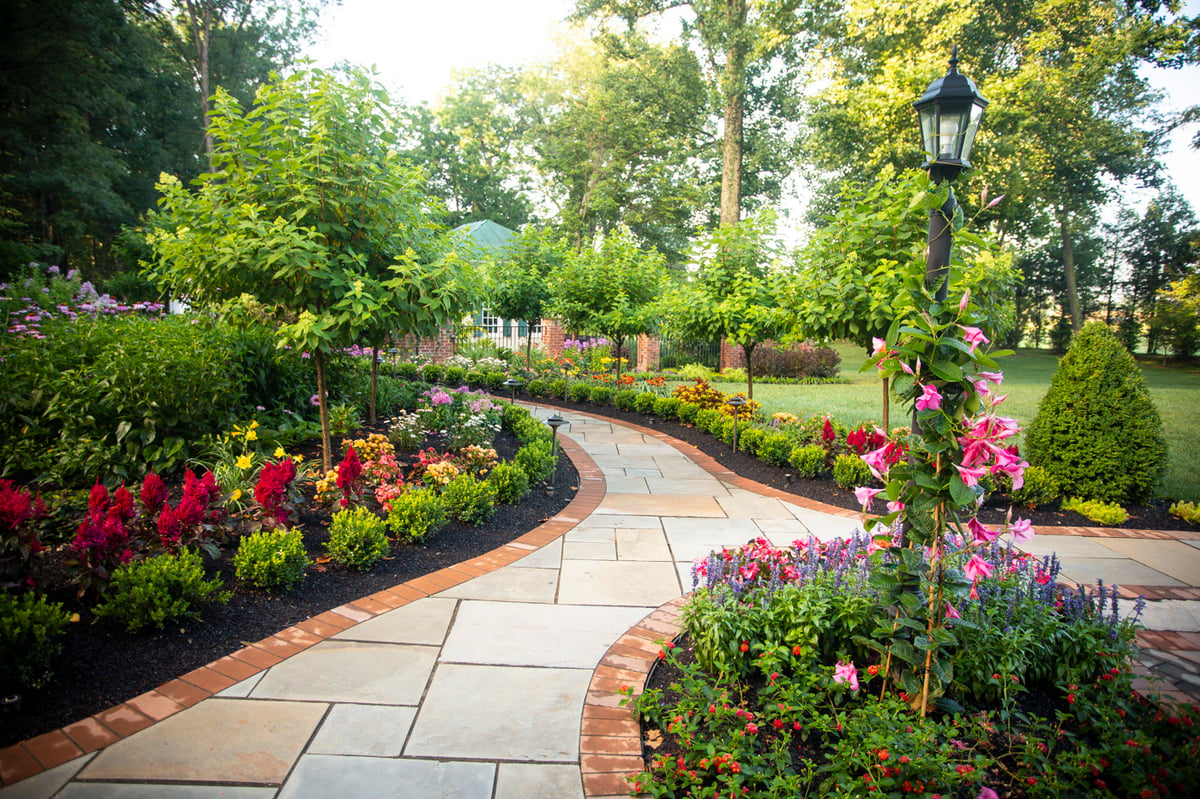 large natural stone walkway with plantings
