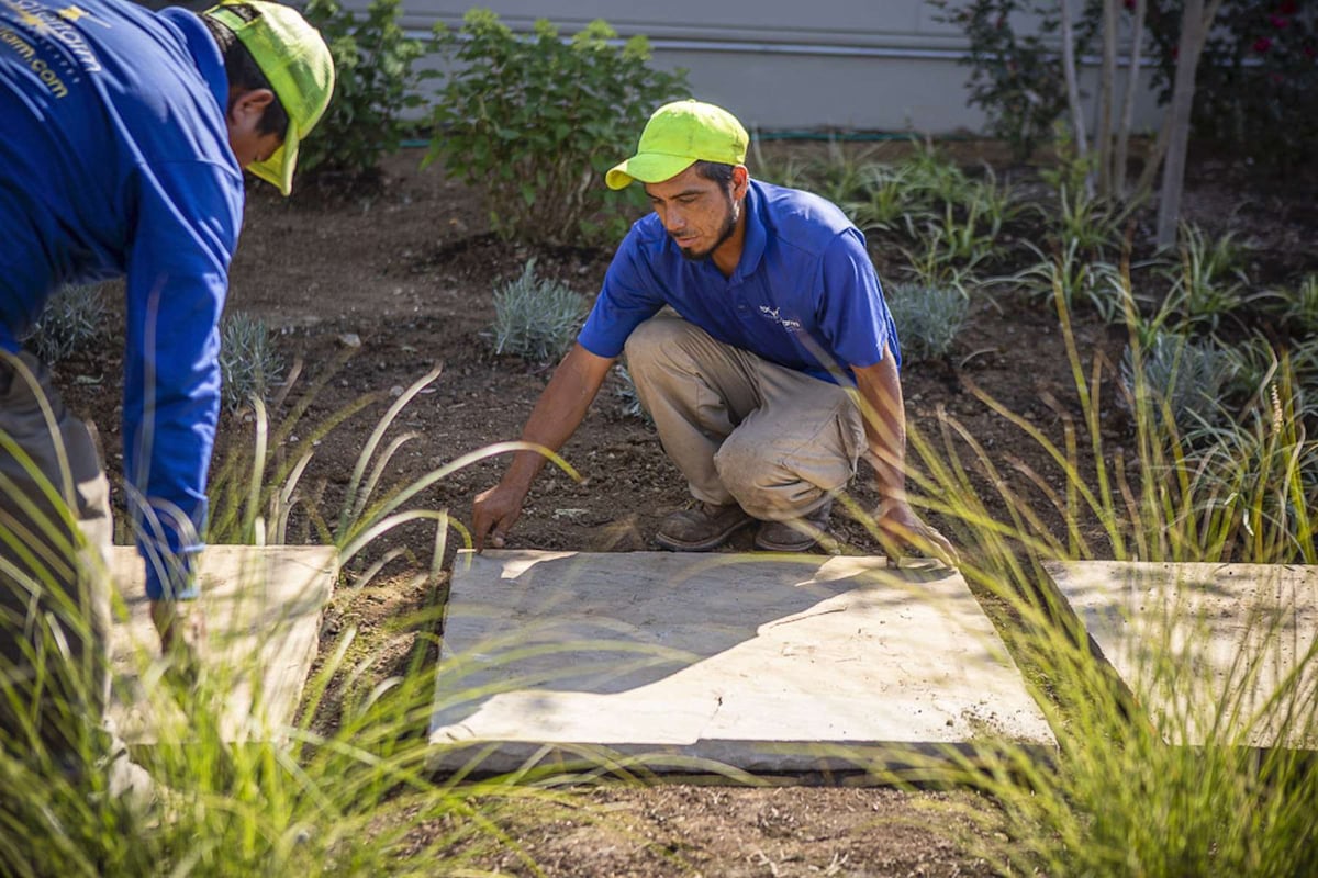 landscape team installs large steppers