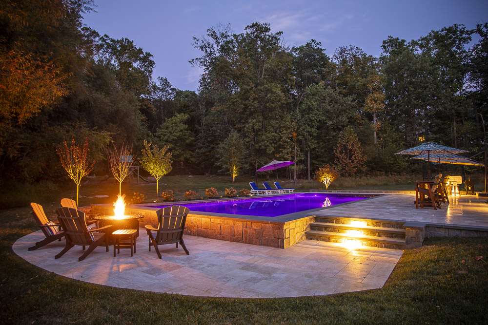 pool patio and steps with landscape lighting