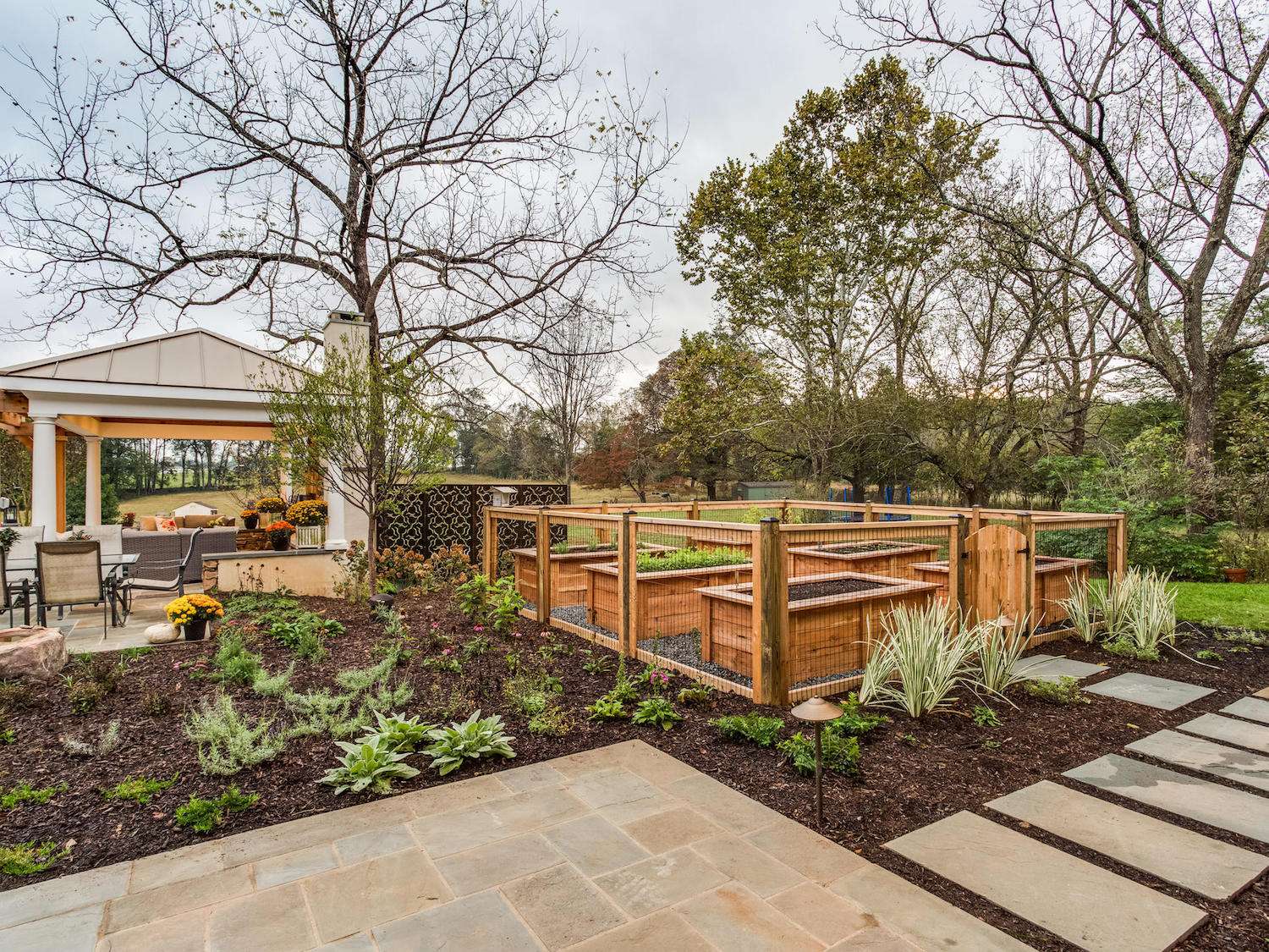 landscape design with multiple plants and a garden in Warrenton, VA