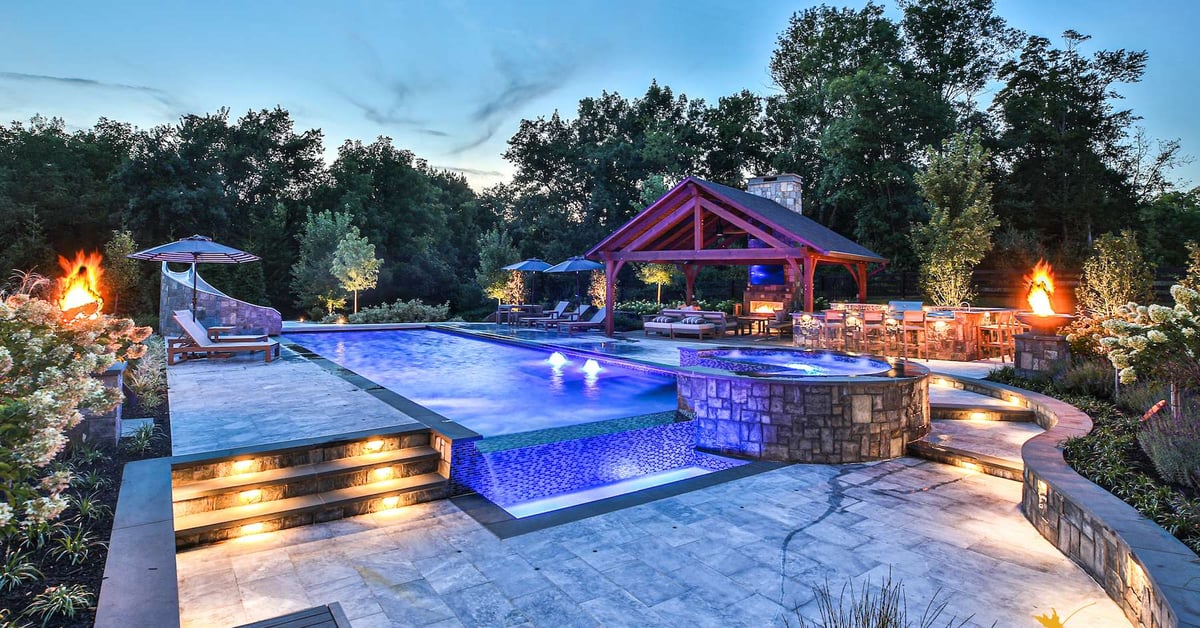 pool with hot tub fire bowl and pavilion