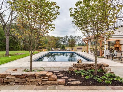 landscape design with pool, fireplace, pavilion, and patio in Warrenton, VA