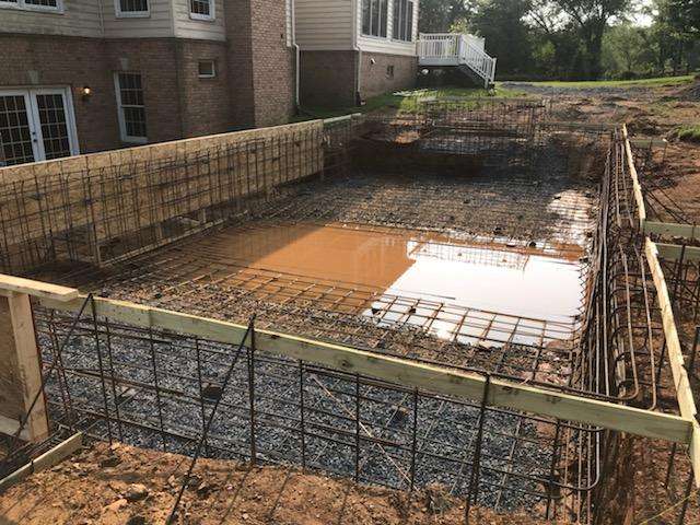 pool construction on sloped property