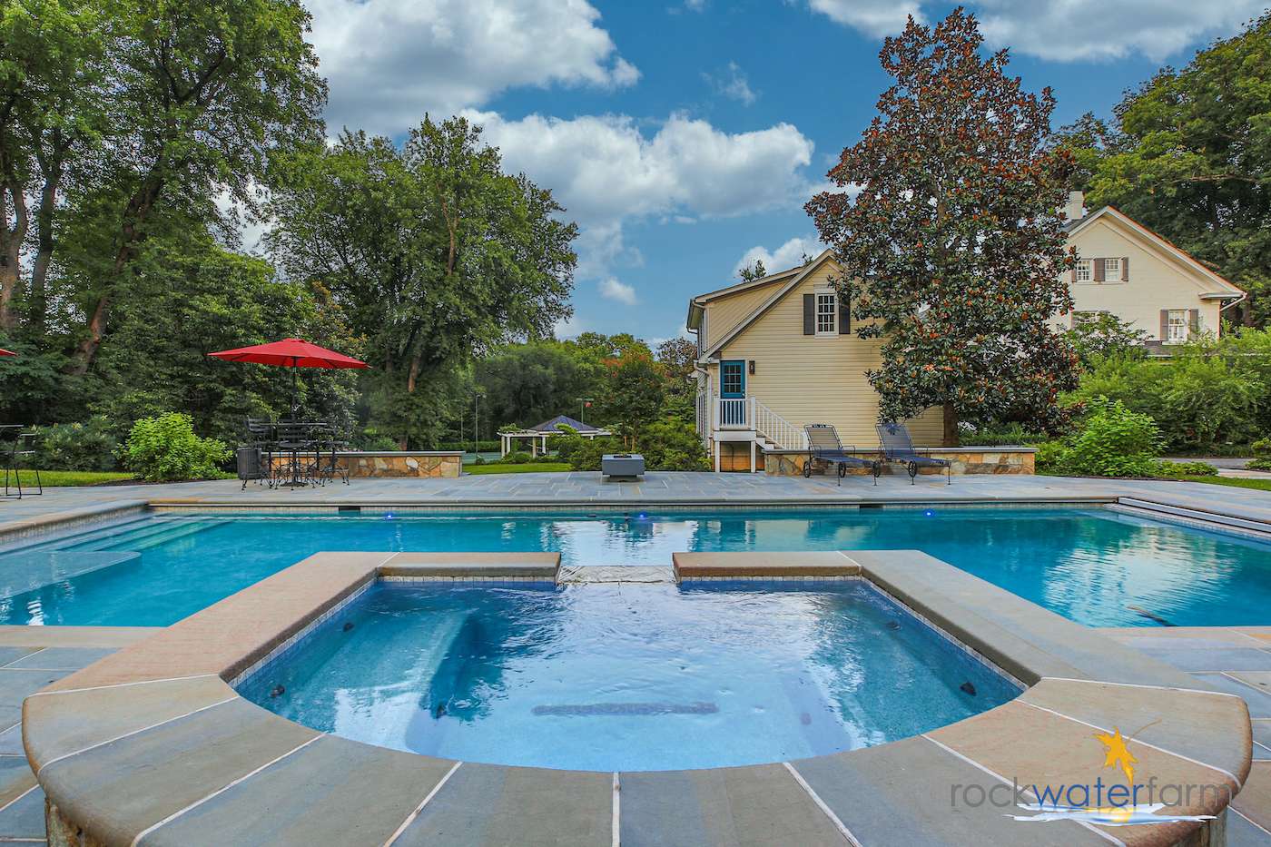 pool with spillover spa