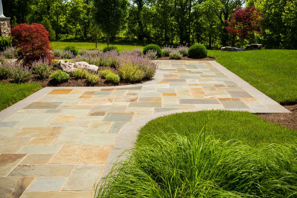 natural stone walkway with plantings