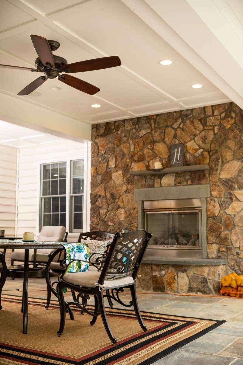 patio with fan under deck