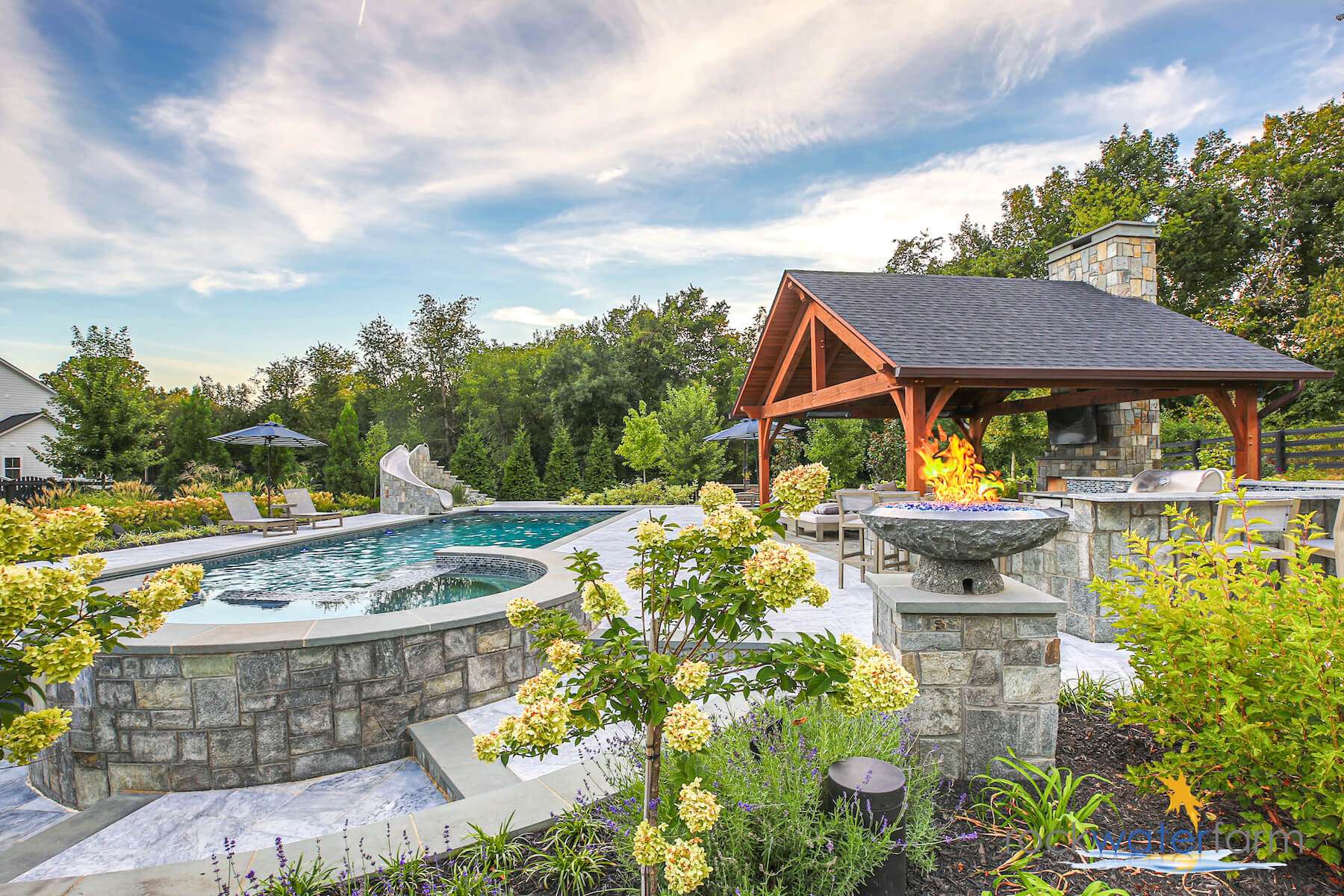 pool with pavilion and hardscape