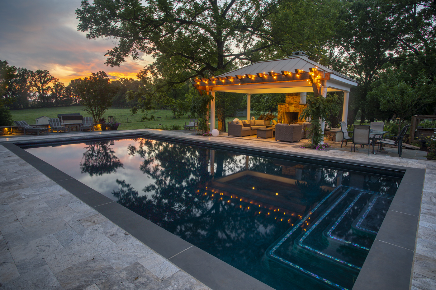 pool with patio and pavilion 