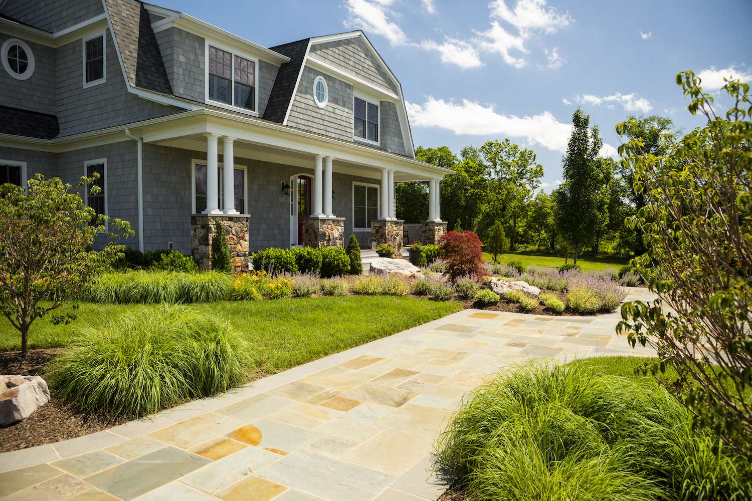 front entrance to home with well maintained landscape