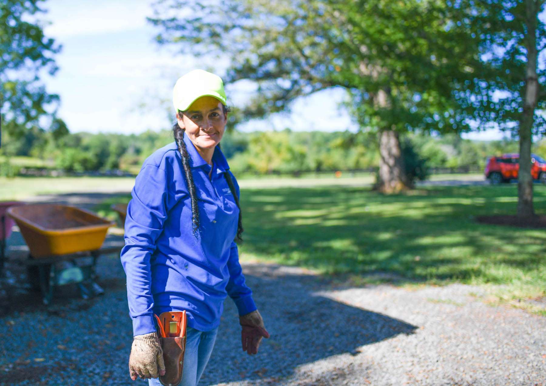 landscape maintenance team member smiling 