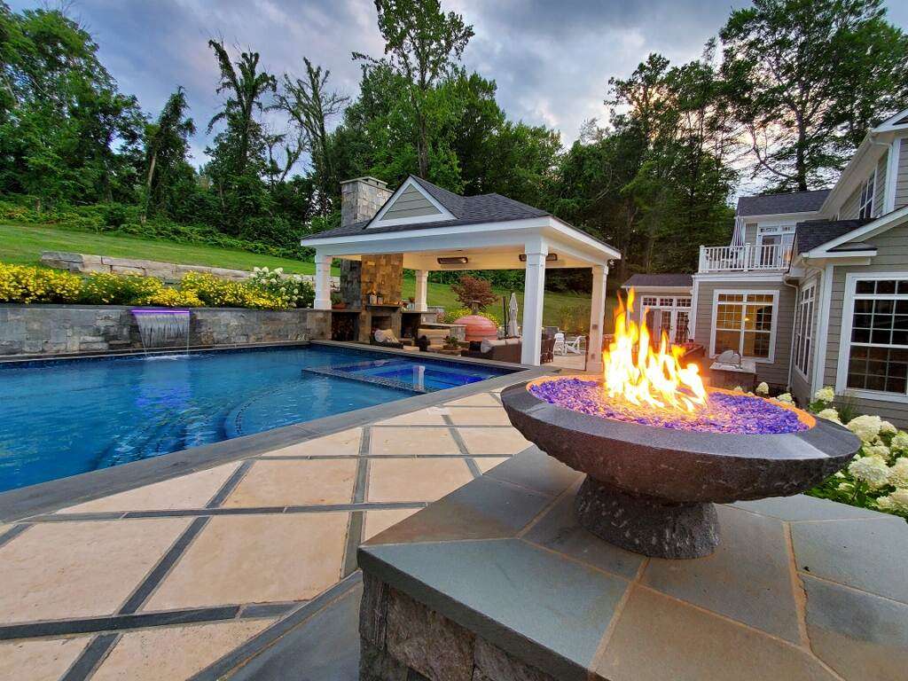 Backyard renovation with pergola, pool, patio and fire bowl